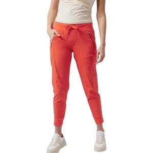 Athleta Trekkie North Jogger Pants Flame Orange Ripstop Hiking 16 Zipper Pockets